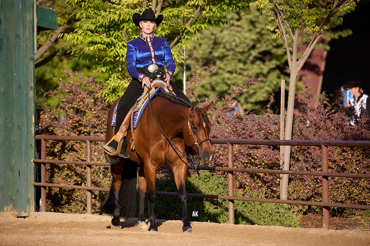 Western rider in competition on a bay horse; Photo by Anna Krause Photography